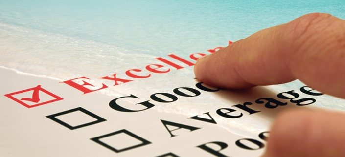 Outdoor image of a house with lighted 	landscape.     Quote - Indoor and out, EF Electric will light up your world.